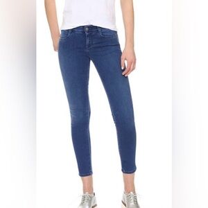 Skinny low rise dark blue jeans